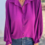 Blusa larga con botones