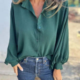 Blusa larga con botones