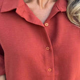 Blusa larga con botones