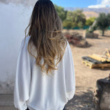 Blusa larga con botones