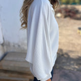 Blusa larga con botones